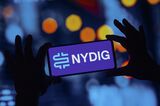 In this photo illustration, the NYDIG logo seen displayed on