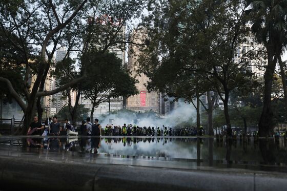 Tear Gas Fired in Downtown Hong Kong as Protesters Defy Ban