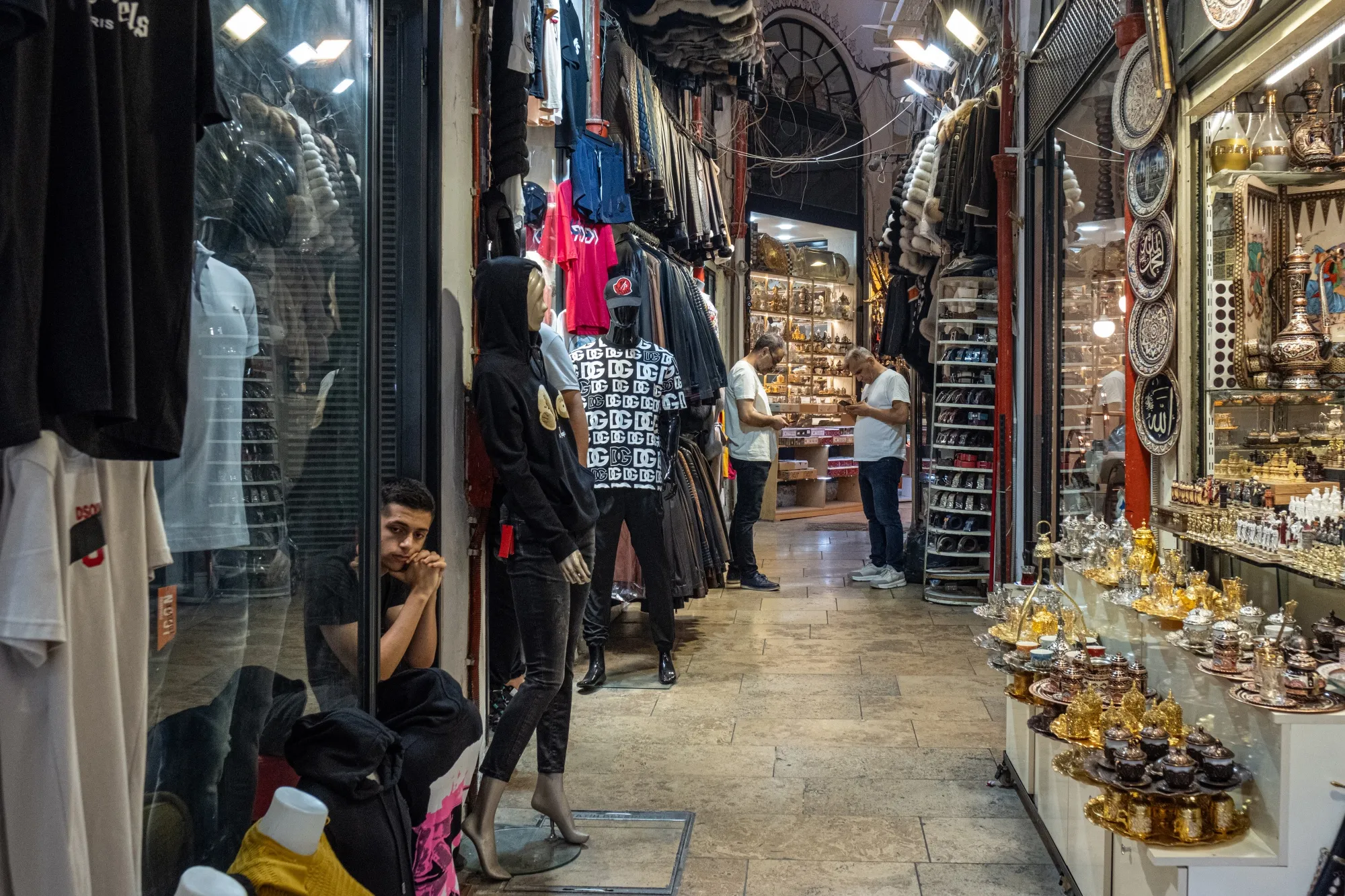 Vendors wait for customers inside the Grand Bazaar in Istanbul, Turkey.