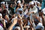 AAP chief Arvind Kejriwalwas, pictured, keeps getting slapped in the face while greeting voters on the campaign trail