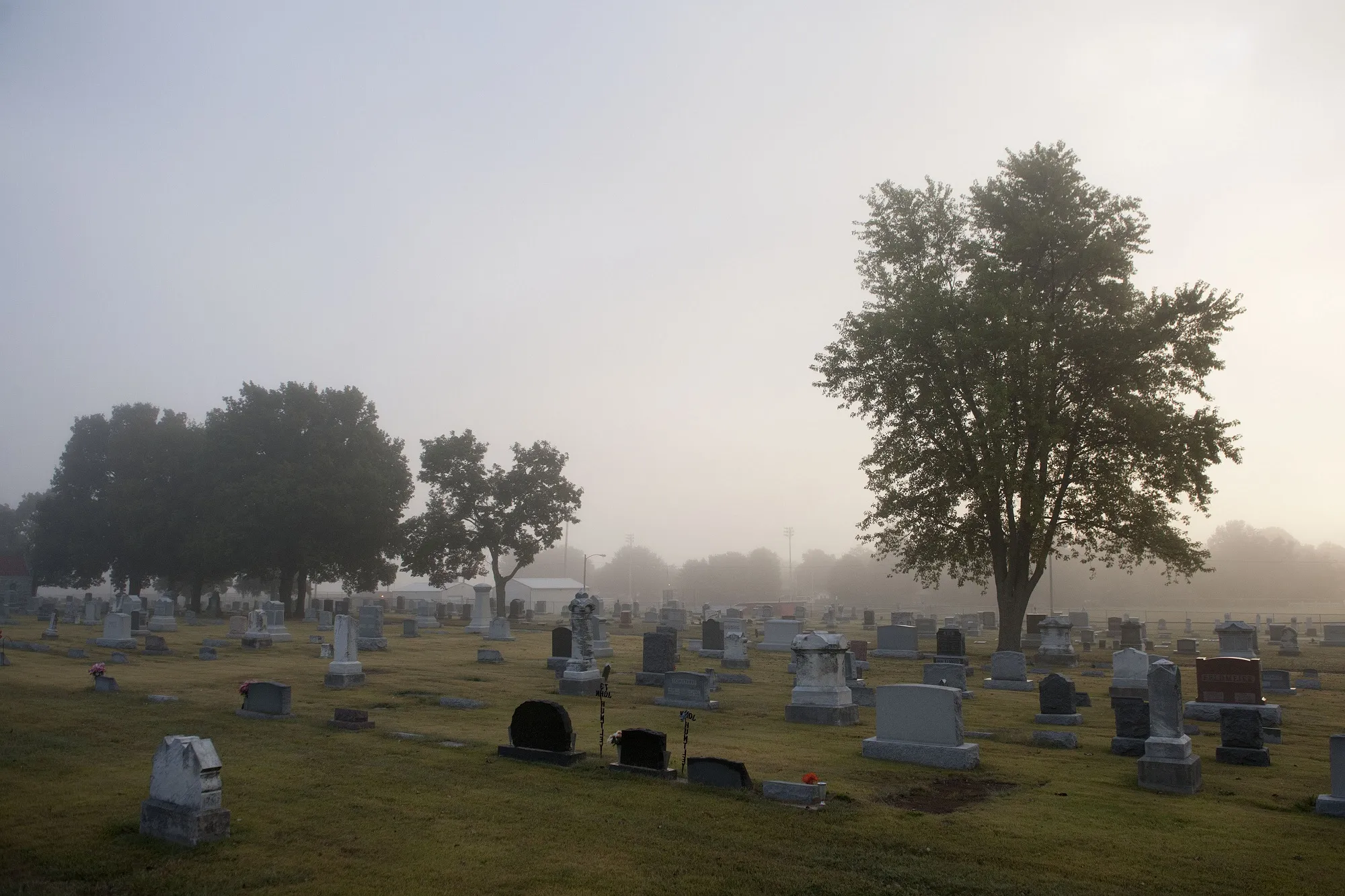 Grave markers stand in the Waterloo City Cemetery in Waterloo, Illinois, U.S., on Monday, Sept. 30, 2013.
