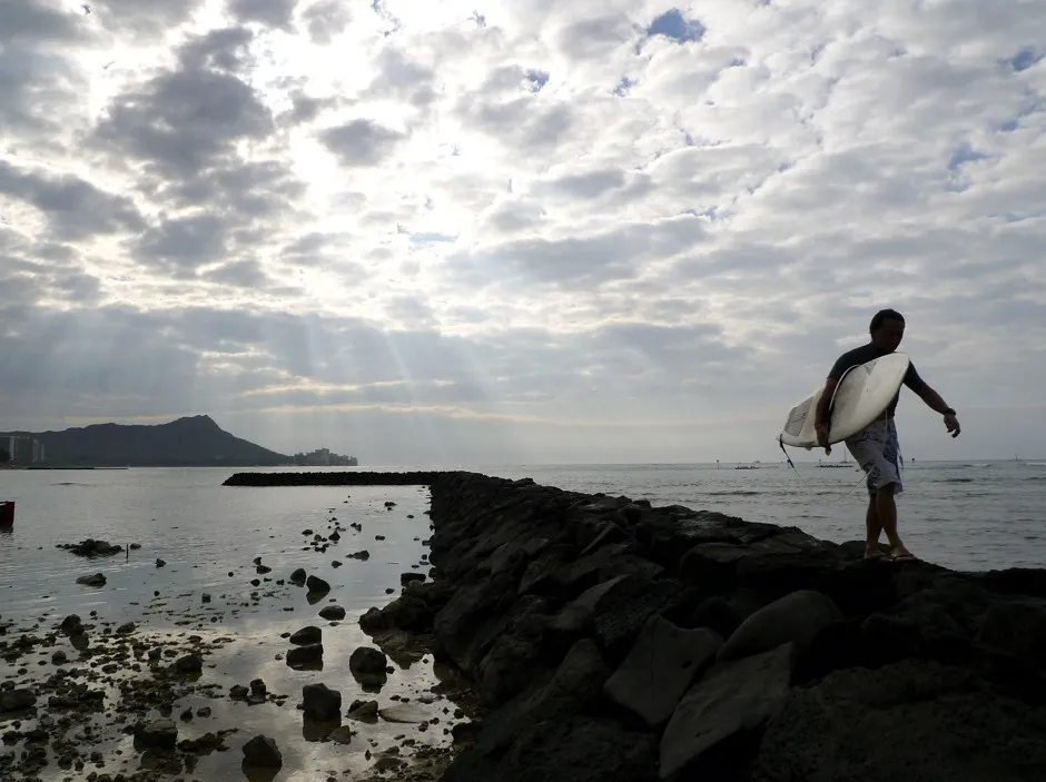 A surfer on Waikiki Beach in Honolulu