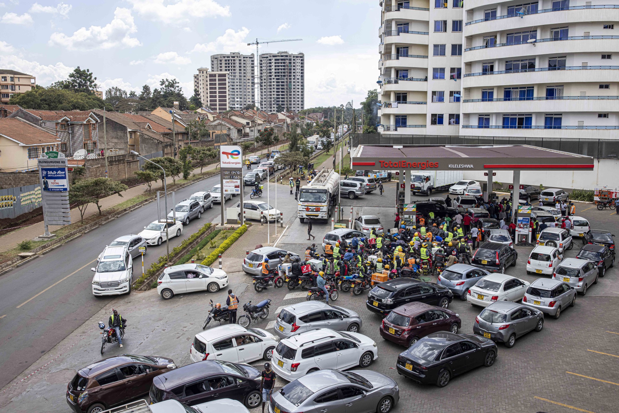 Drivers and motorcyclists queue for fuel at a&nbsp;gas station in Nairobi, Kenya, on&nbsp;April 13.