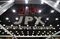 Tokyo Stock Exchange and Stock Boards As Japan Shares Dip With Banks As Volatility Returns to Markets