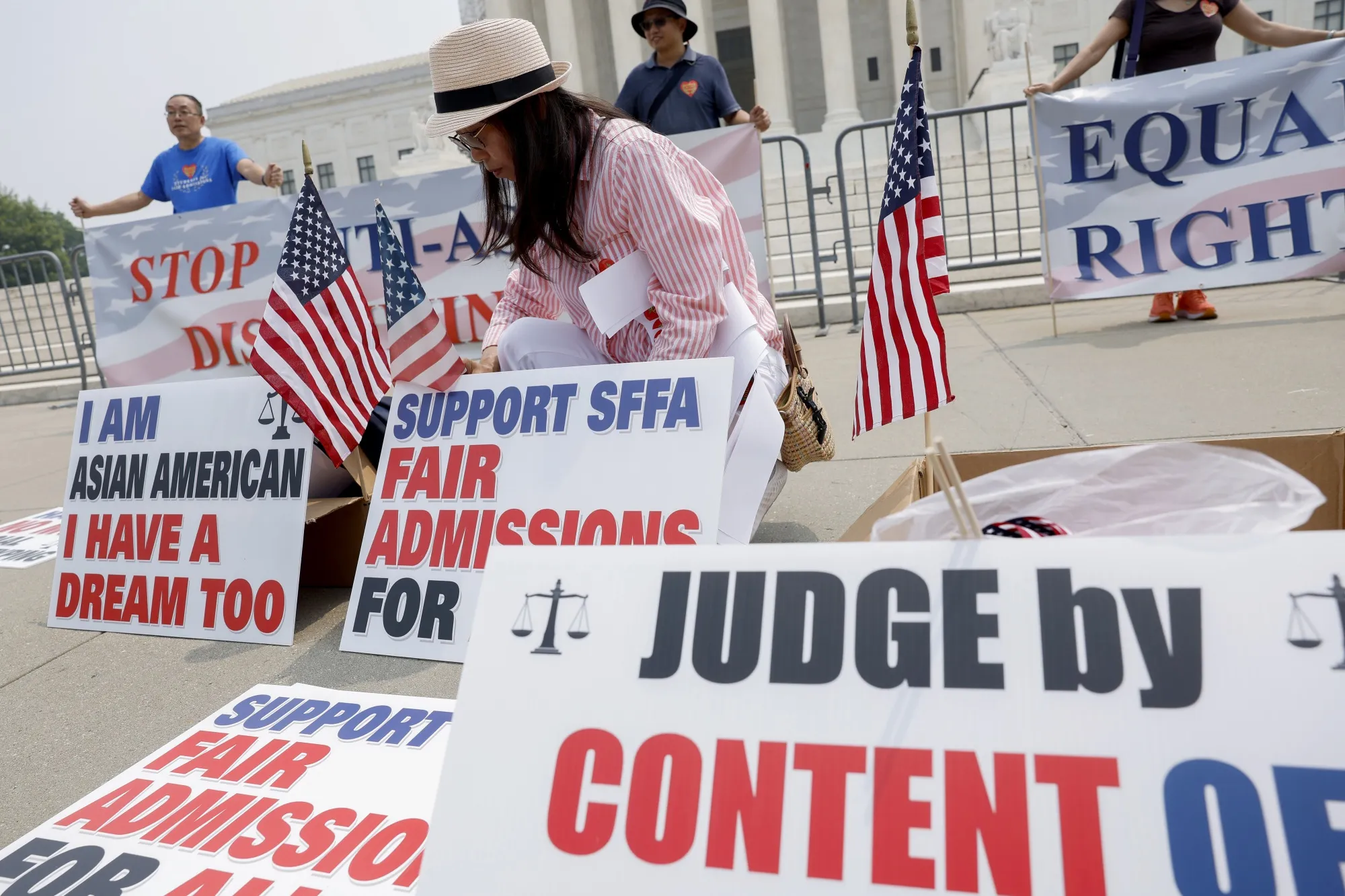 Activists affiliated with Students for Fair Admissions outside the US Supreme Court.