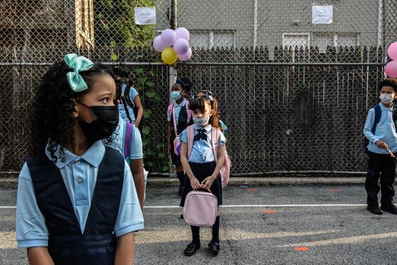 Tiny Masks Are Scarce as Unboosted Kids Return to Classrooms
