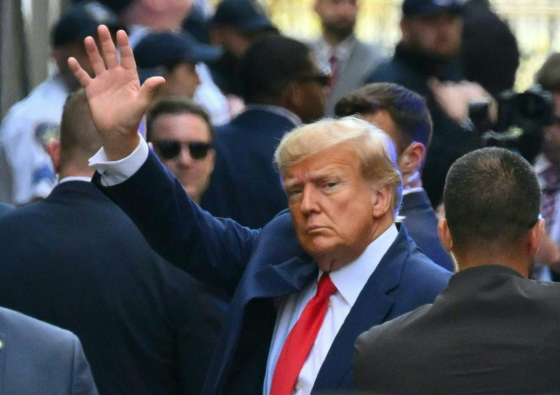 Former US president Donald Trump arrives ahead of his arraignment at the Manhattan Criminal Court in New York on April 4, 2023.