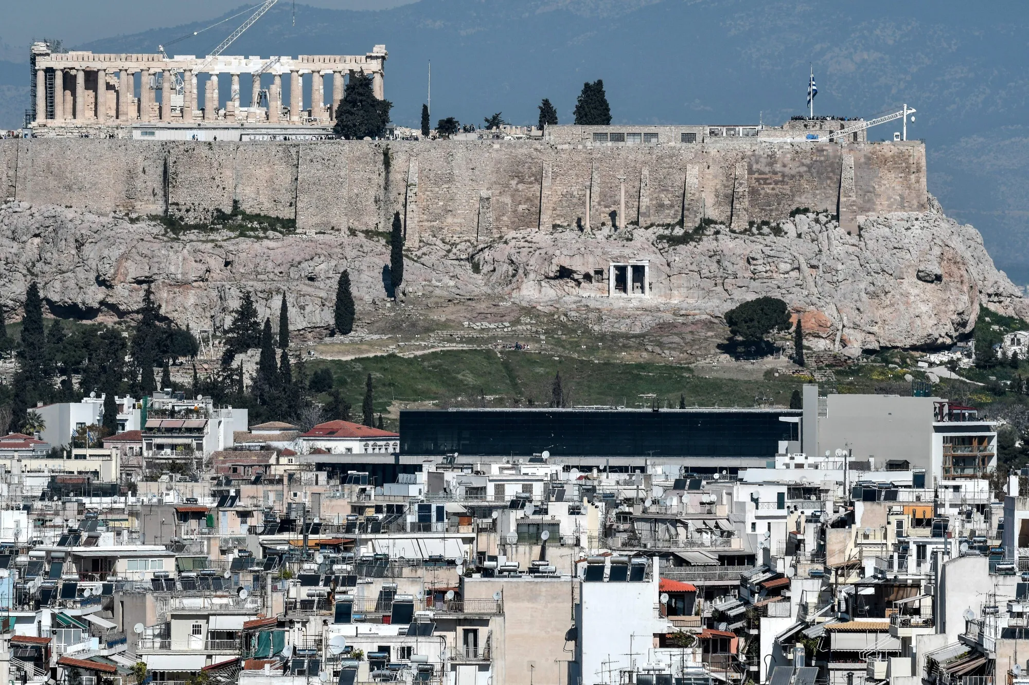 Residential properties sit near the Acropolis in Athens.
