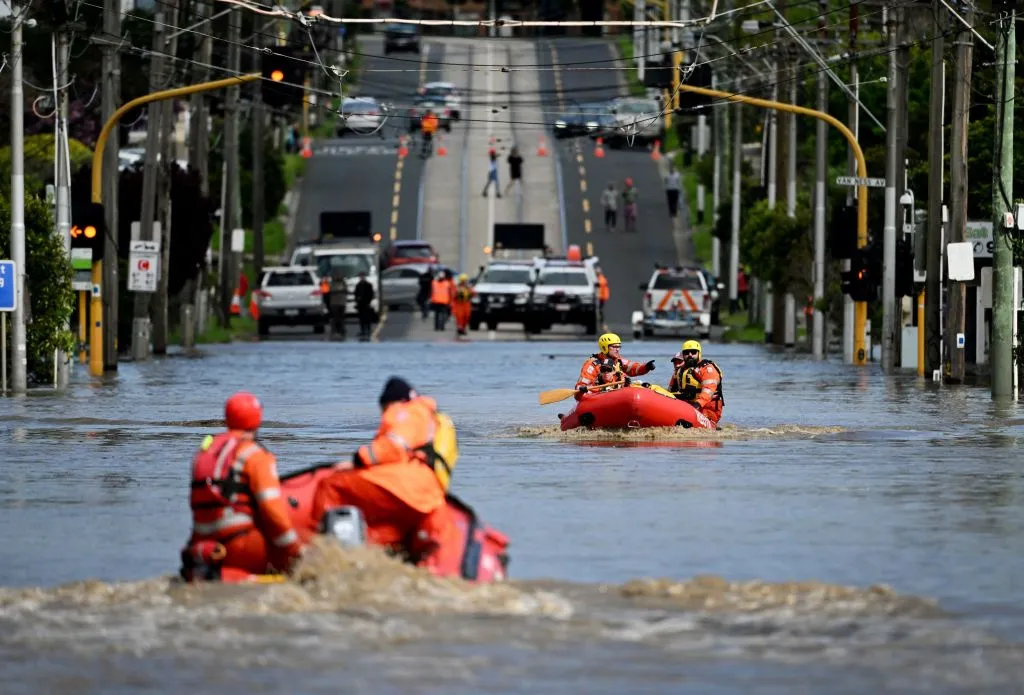 Emergency workers patrol a flooded area as they evacuate residents in the Melbourne suburb of Maribyrnong, in 2022.