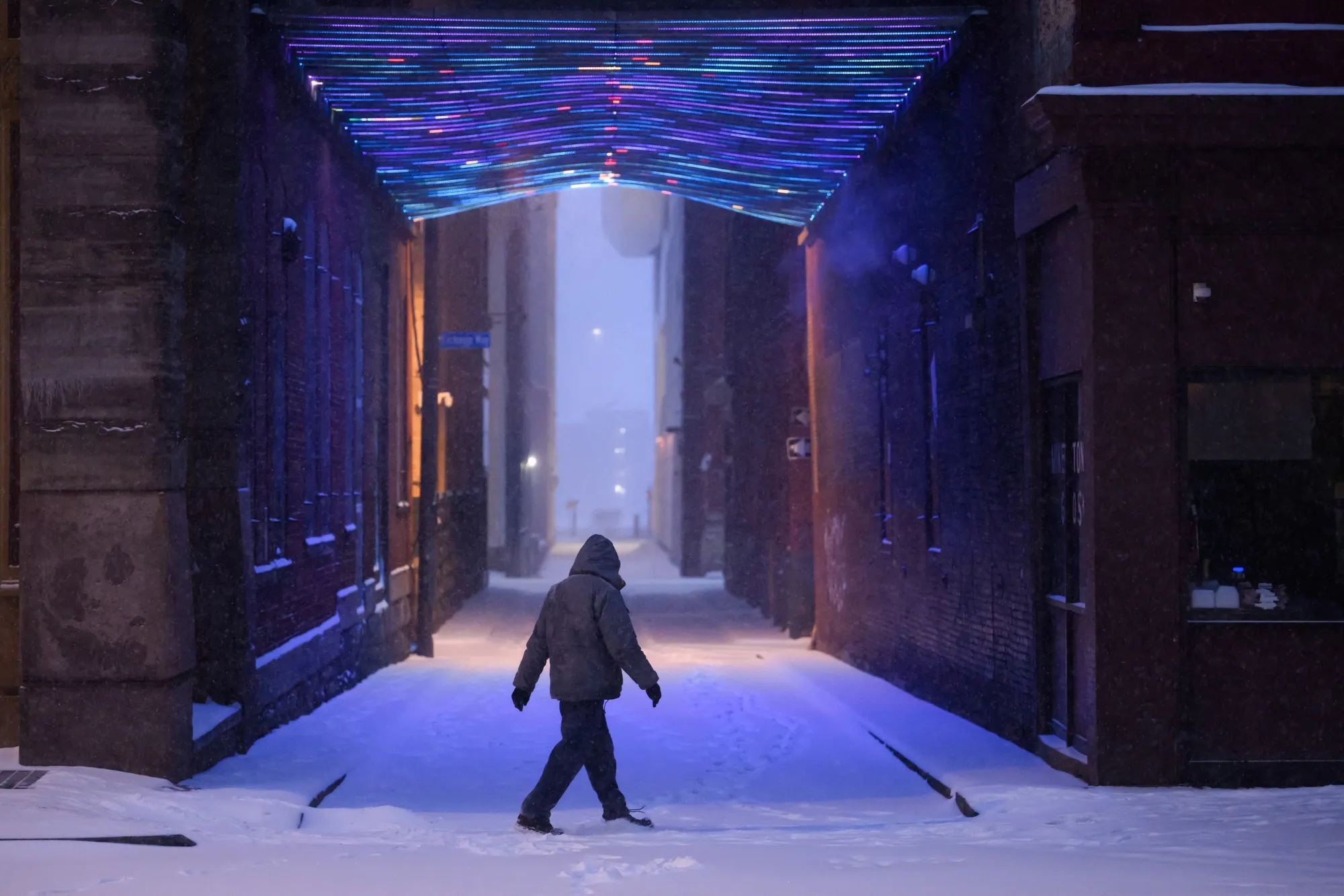A pedestrian during a winter storm in downtown Pittsburgh on Sunday, Jan. 25, 2026.