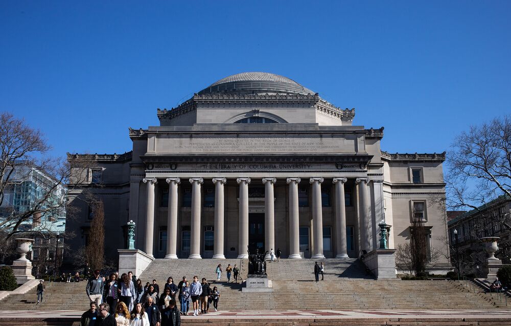 People walk on the Columbia University campus on March 9.