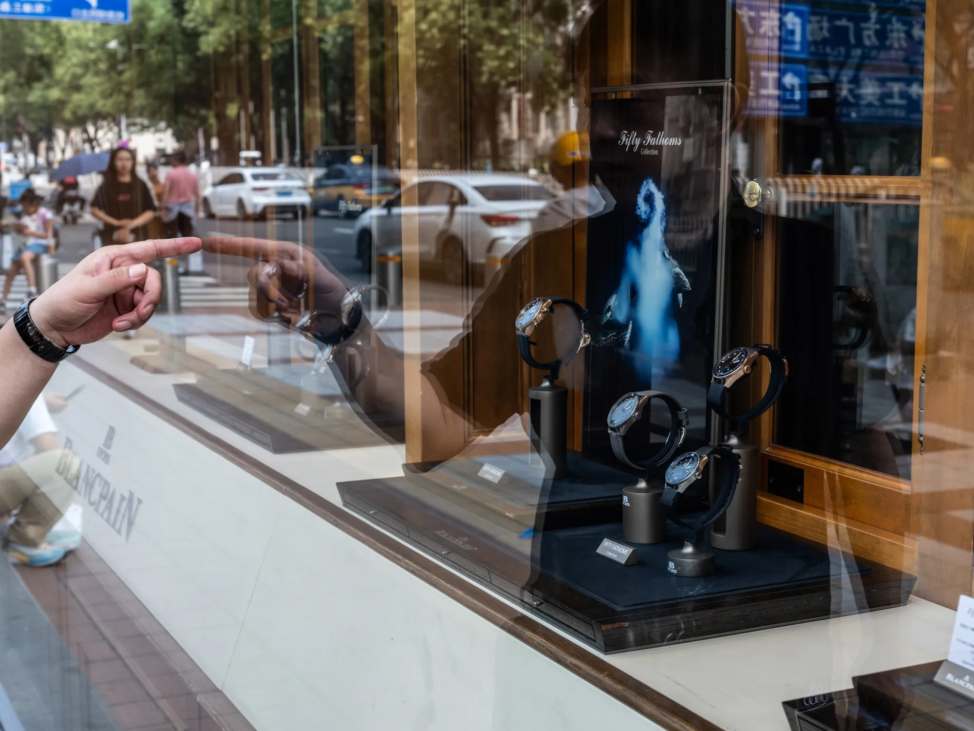 Luxury watches on display at a store in Beijing.