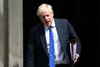 UK Prime Minister Boris Johnson Clings On After Resignations