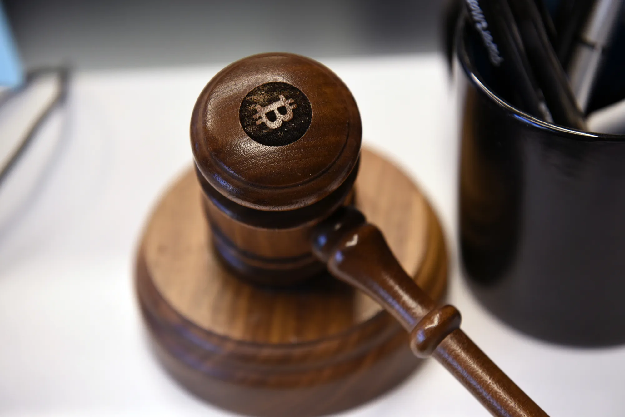 A Bitcoin gavel sits&nbsp;on a desk at the Coinbase Inc. office in San Francisco, California.