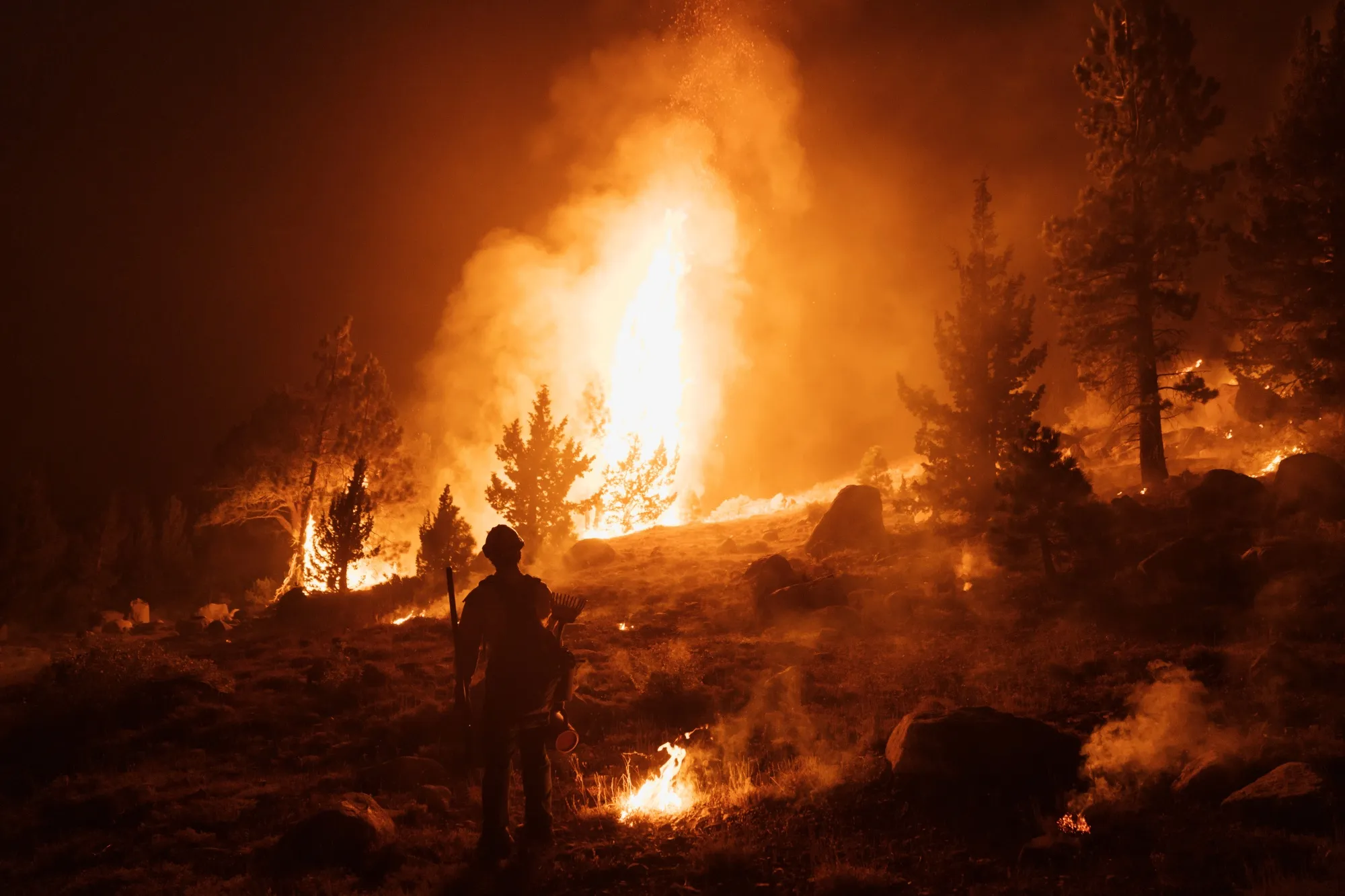 Firefighters perform a controlled burn as a preventative measure during the Caldor Fire in Kirkwood, California,&nbsp;in September.