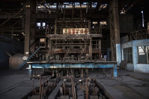 Machinery sits idle in an abandoned steel plant in Tangshan.