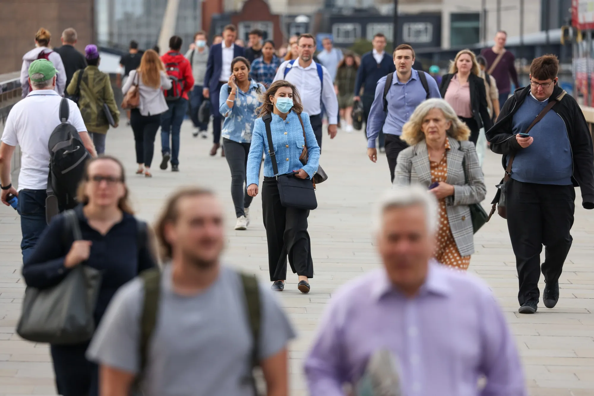 Morning commuters cross London Bridge,&nbsp;on Sept. 13.