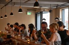 People dine at the bar at Mhel, an East Asian restaurant on Bloor West.