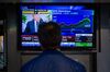 NEW YORK, NY - MARCH 8: President Donald Trump is displayed on a television monitor as a trader watches on the floor of the New York Stock Exchange (NYSE) ahead of the closing bell, March 8, 2018 in New York City. Despite opposition from his own party and allies abroad, President Trump signed an order on Thursday that will impose tariffs on steel and aluminum imports. (Photo by Drew Angerer/Getty Images)
