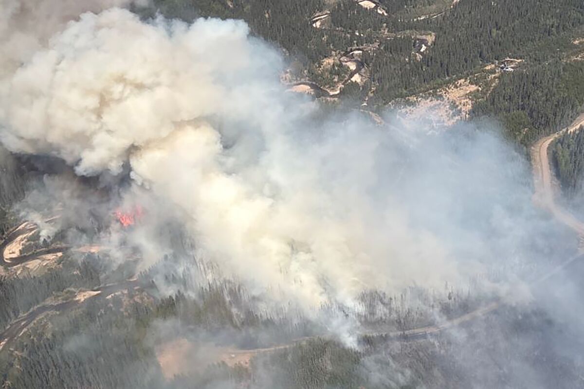 Wildfires Force Evacuations, Halt Alberta Oil Production