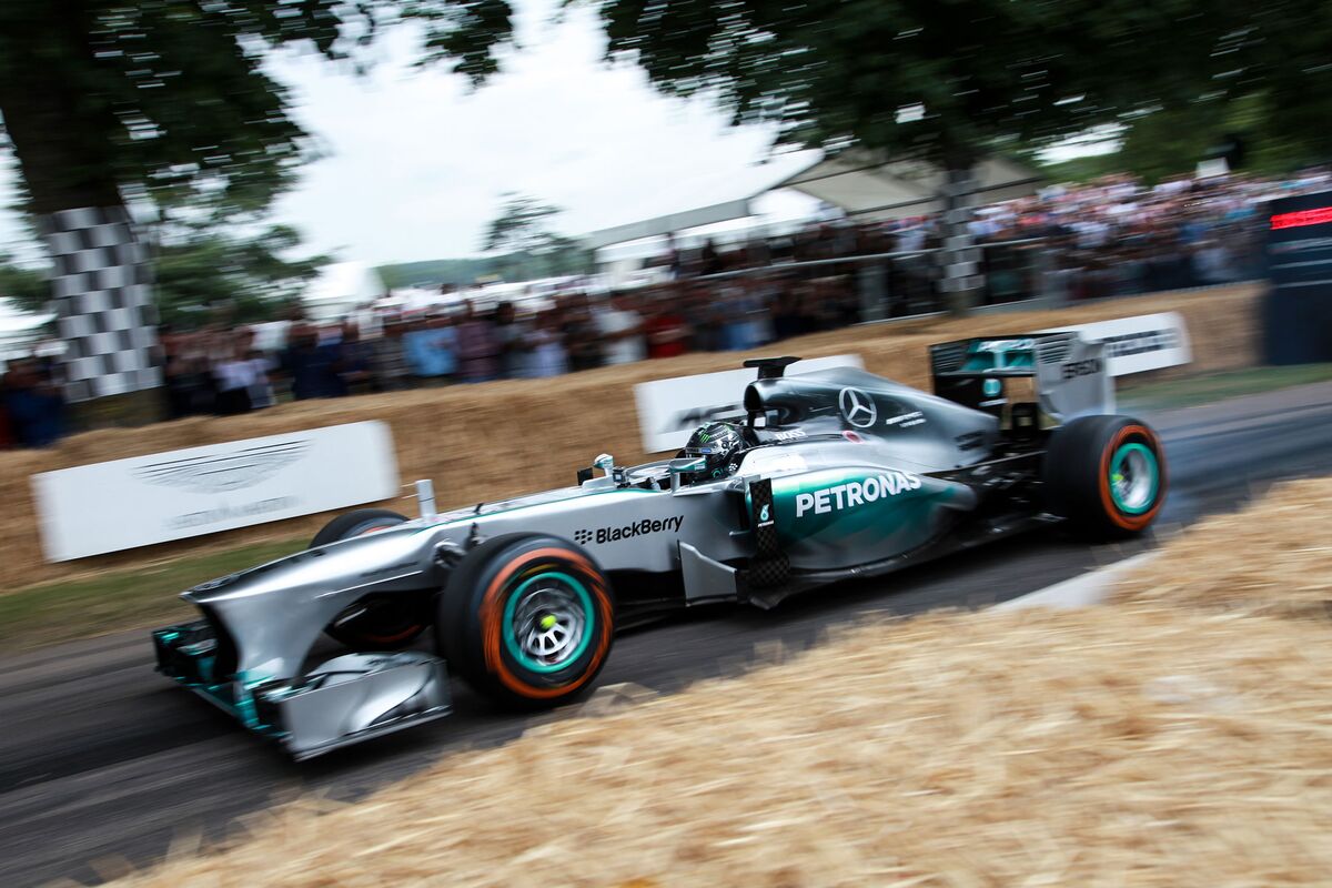 Taylor swift races a car in Goodwood festival of