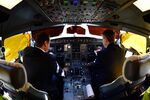 Pilots in the cockpit of an Aeroflot passenger aircraft.