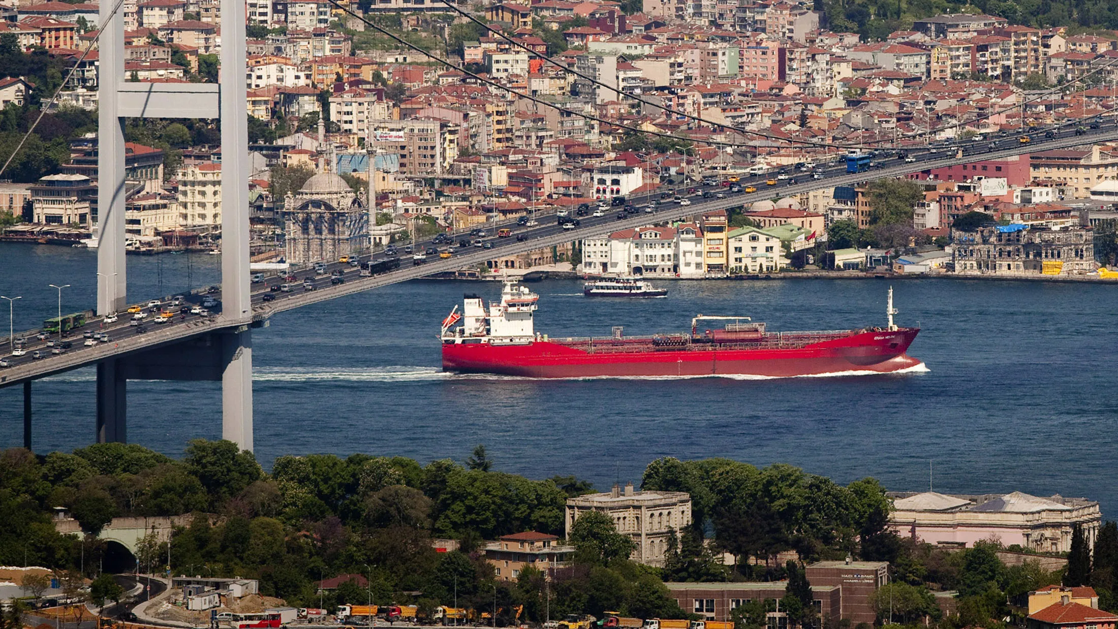 A tanker ship passes beaneath a bridge over the Bosporus shipping channel in Istanbul, Turkey in 2011.
