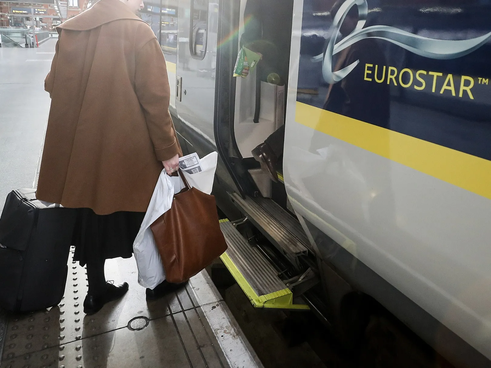 Passengers board a&nbsp;Eurostar train in London.