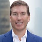 Headshot of Paul J Taubman