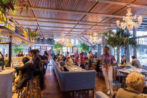 Santina's dining room, under the High Line, is light and bright.