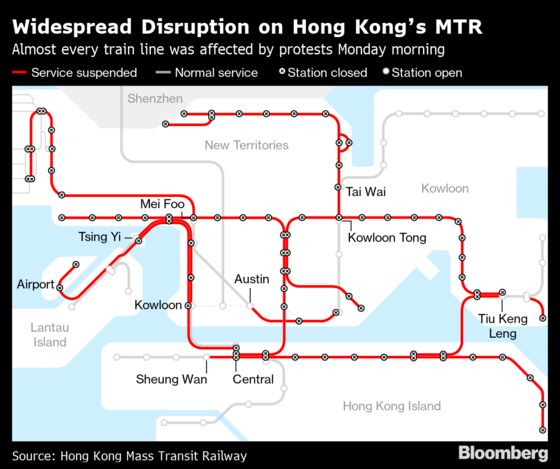 Hong Kong Leader Warns of ‘Ruin’ as Strike Snarls City, Airport