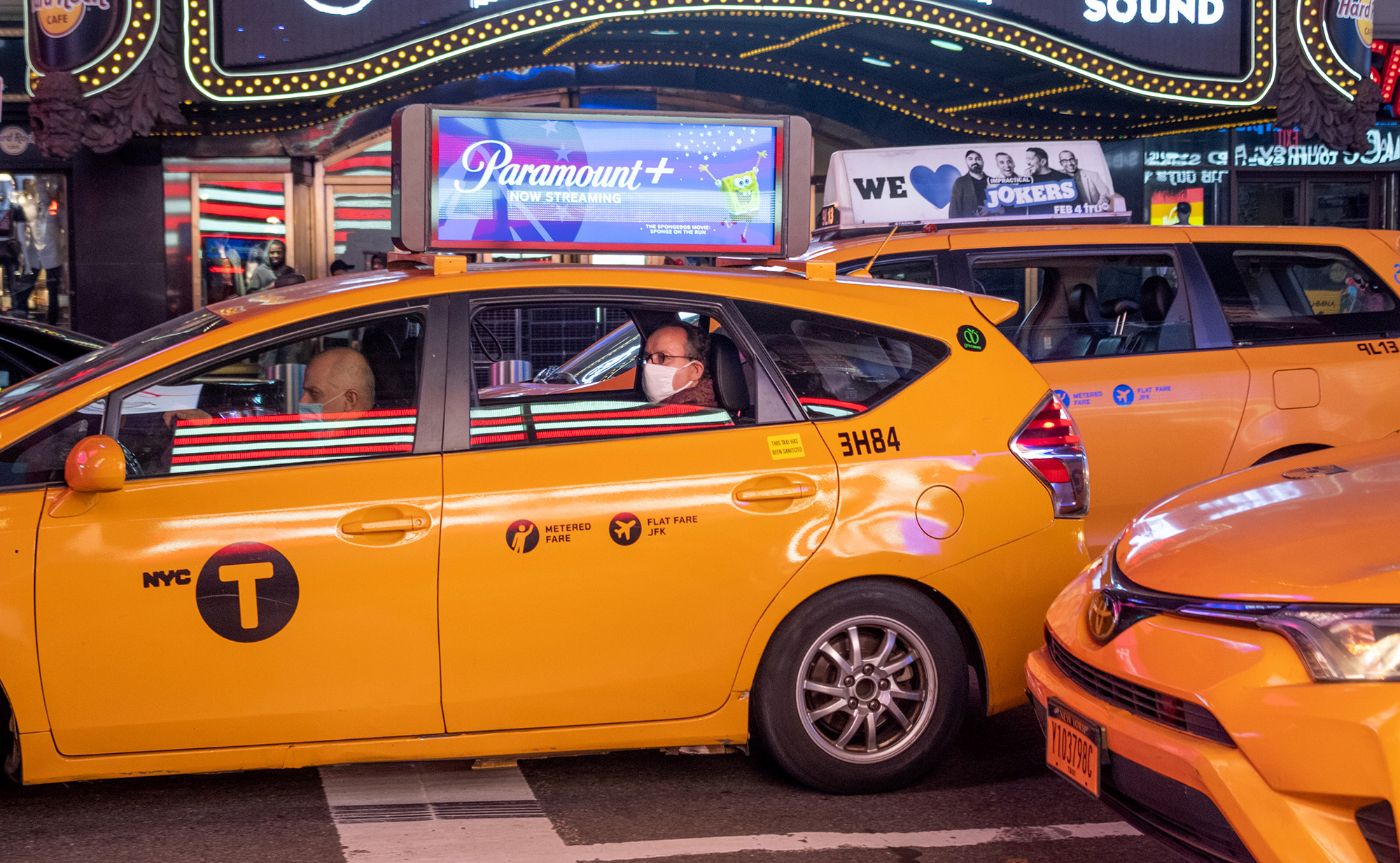 Taxi cabs pass through Times Square in New York on March 11.