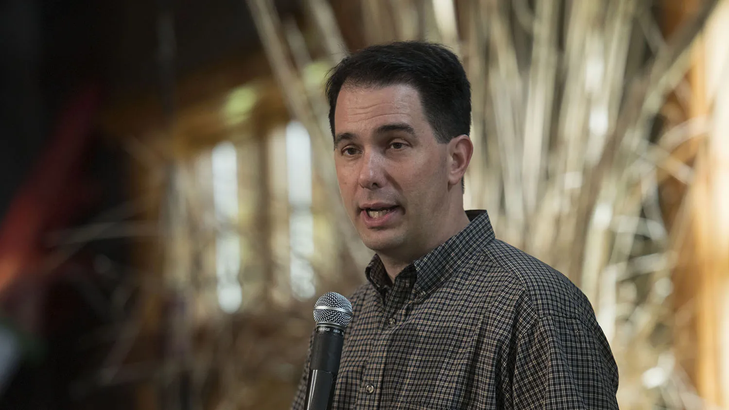 Scott Walker, governor of Wisconsin, speaks during the Chad Airhart Blue Jean Bash fundraiser in West Des Moines, Iowa, U.S., on Saturday, May 16, 2015. Walker declined to say whether he would participate in the Iowa Straw Poll in August if he does become a candidate.
