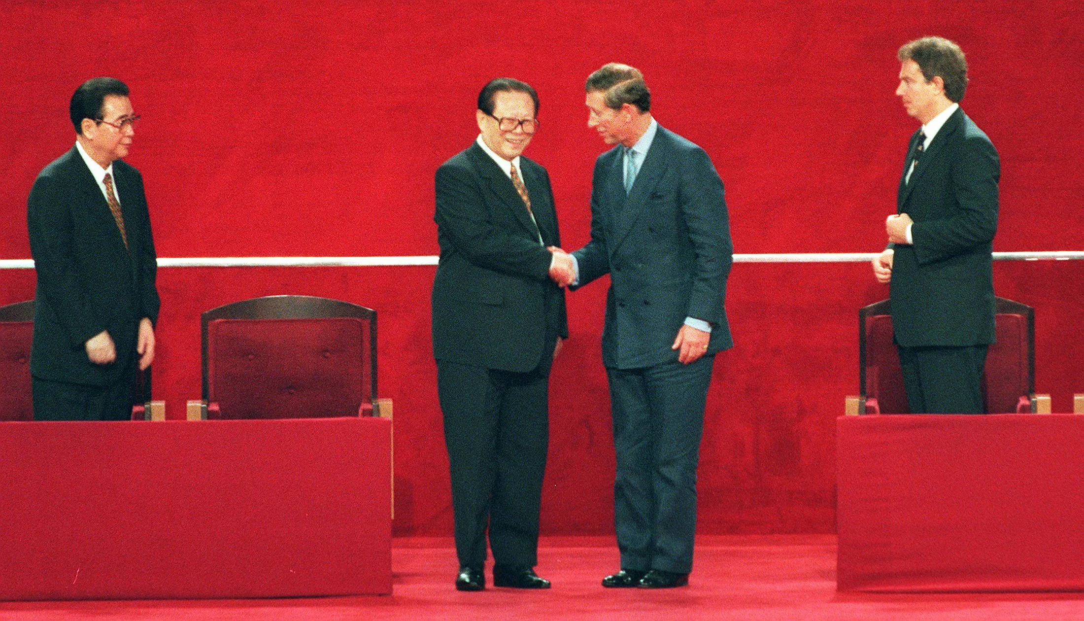 Jiang Zemin, second left, shakes hands with Prince Charles following Hong Kong’s transfer of sovereignty from British to Chinese rule, in Hong Kong, on July 1, 1997. 