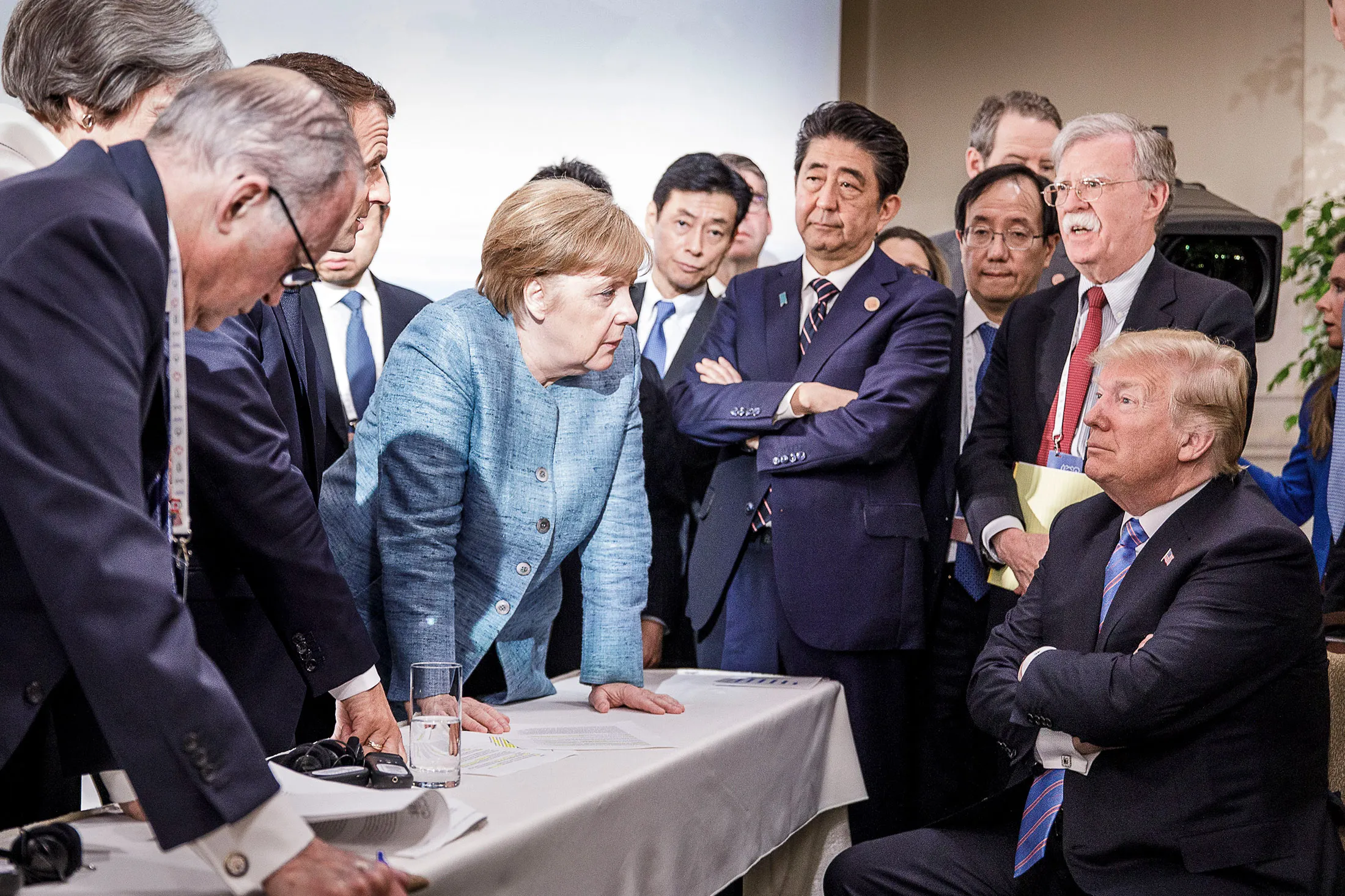 German Chancellor Angela Merkel deliberated with US President Donald Trump and others at the 2018 G-7 summit in Charlevoix, Canada—the last time Canada was the host country.
