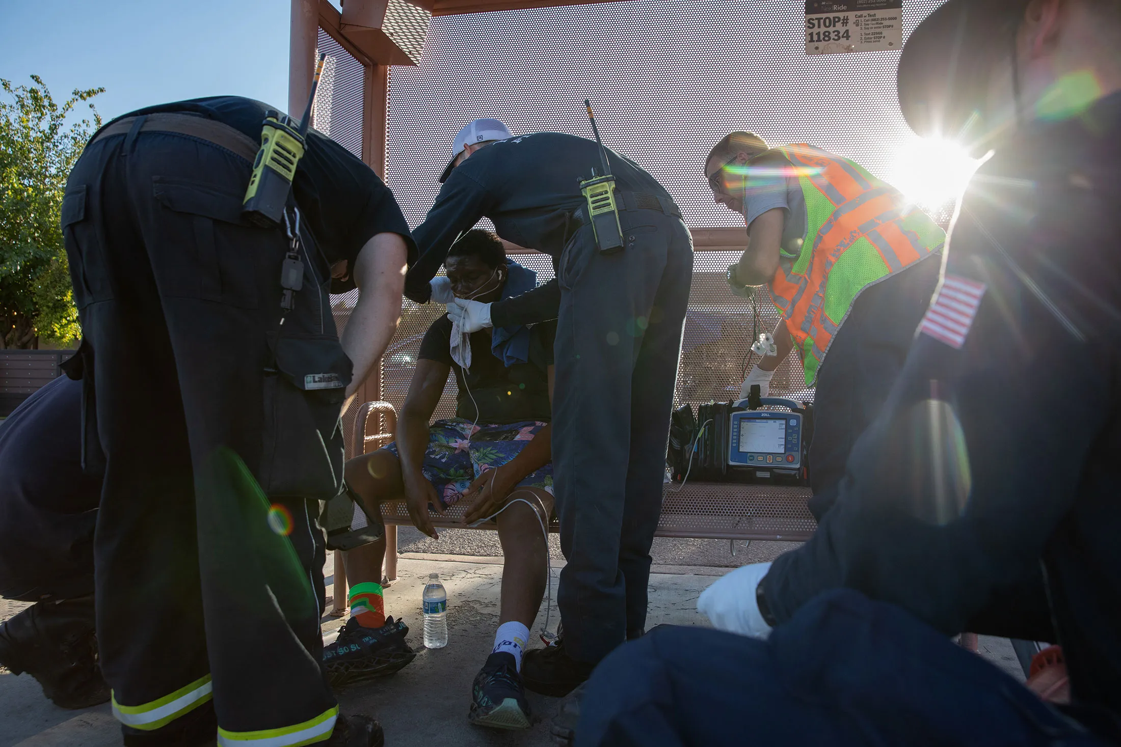 Firefighters in Phoenix&nbsp;provide treatment for a resident having trouble breathing on day when temperatures reached 119F (48C). The city has endured&nbsp;a record-setting streak of days above 110F this month.