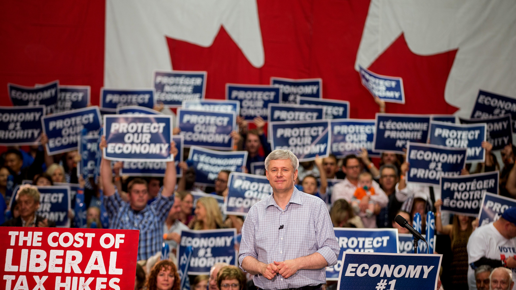 Conservative leader Stephen Harper looks on during a rally in London, Ontario.
