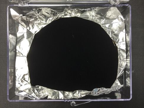 Vantablack is so black, it makes 3D objects like this crinkled tinfoil look like flat silhouettes.
