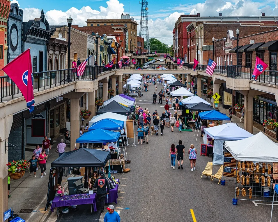 Morristown shows off its signature feature — a two-story sidewalk — at a downtown street festival. 