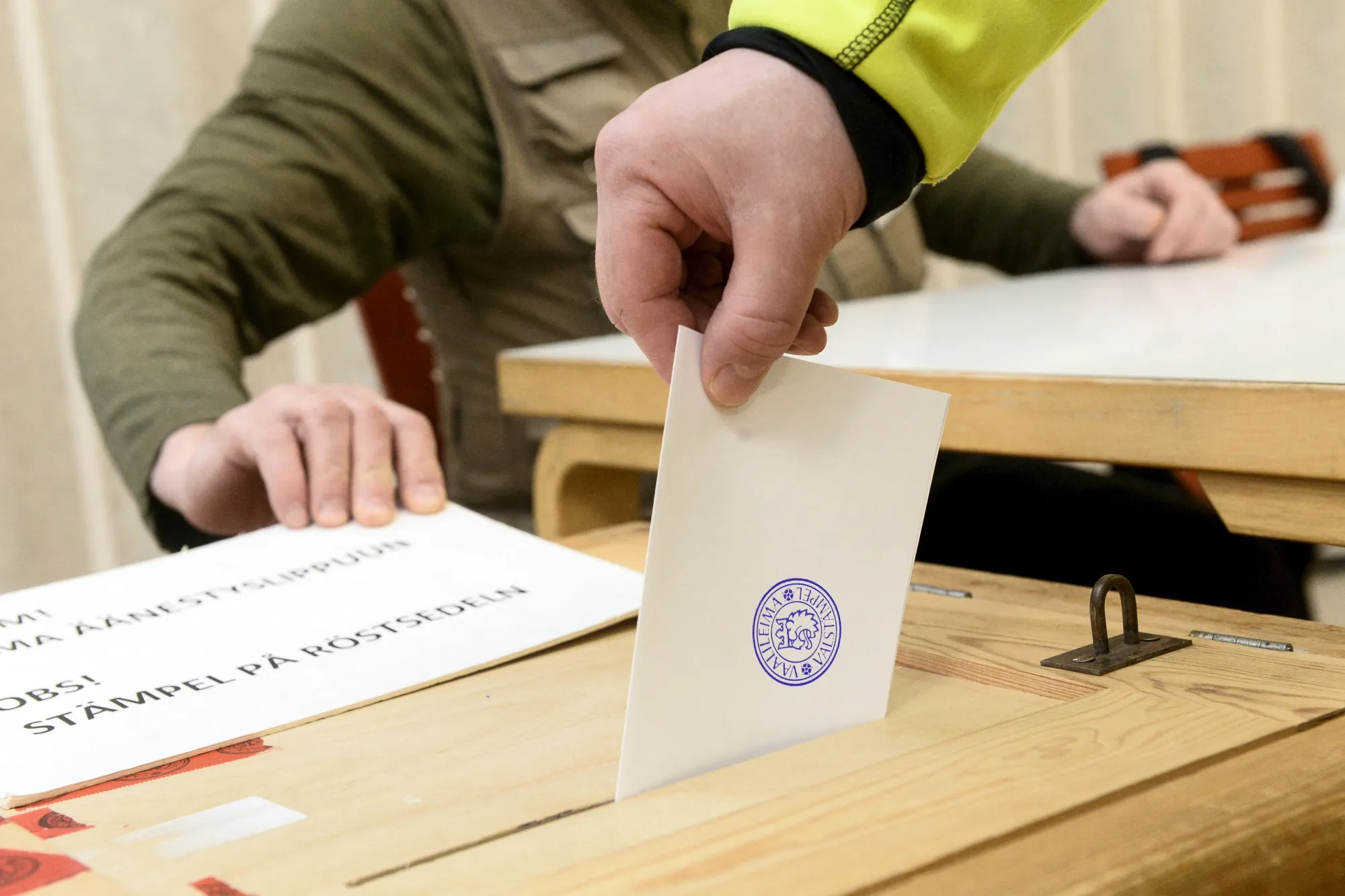 A voter casts his ballot in Espoo, Finland.