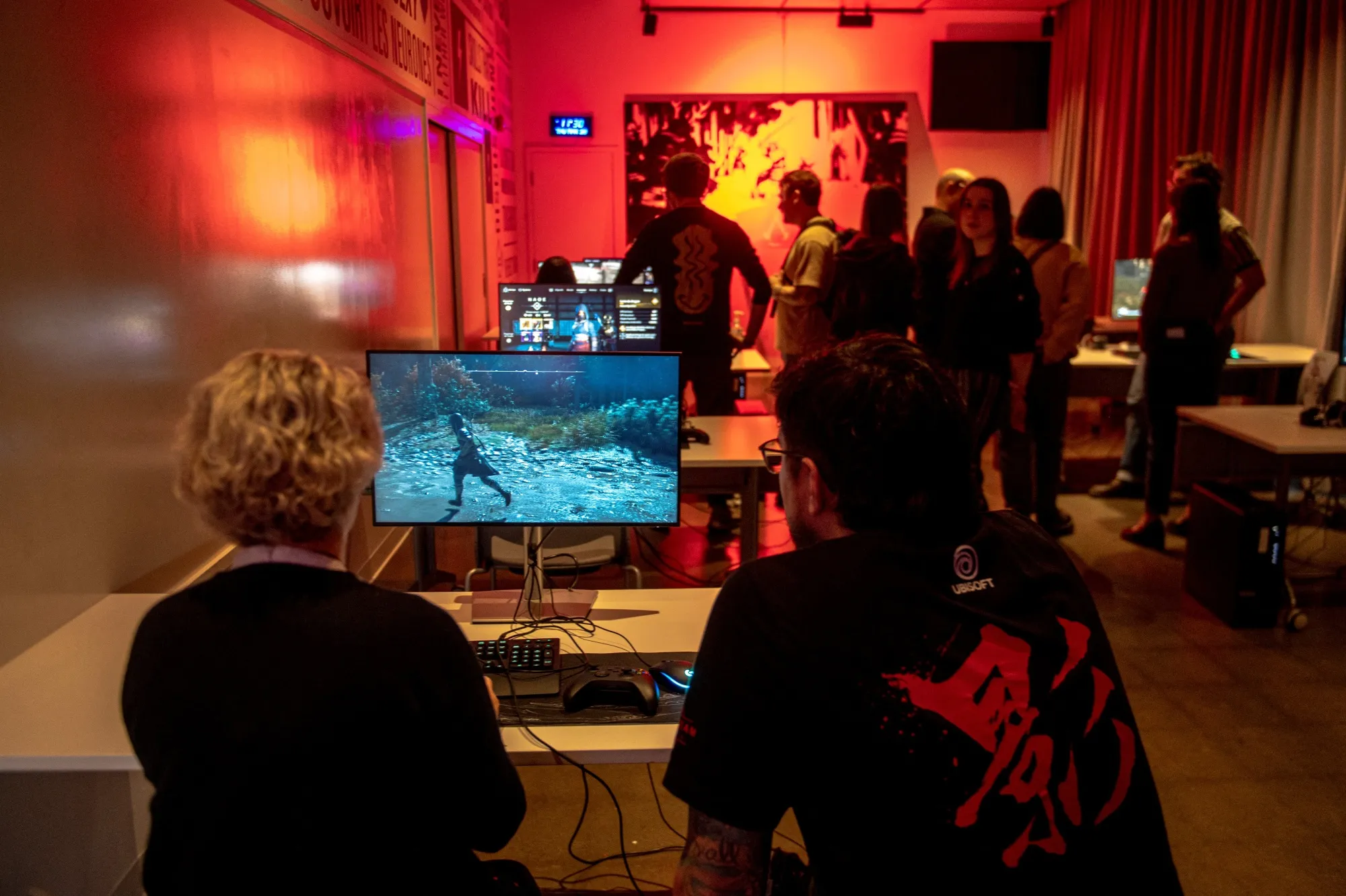 Visitors test play Assassin's Creed Shadows at the Ubisoft Quebec Studio in March.