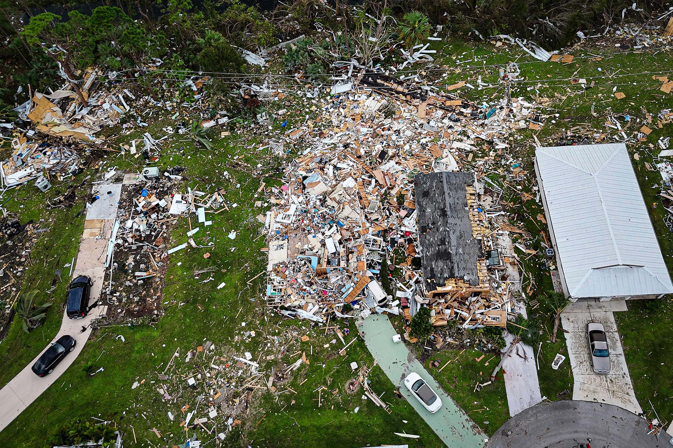 Destroyed houses in Port St Lucie, Florida, after a tornado hit the area and caused severe damage as Hurricane Milton swept through Florida on October 11, 2024. Photographer: Miguel J. Rodriguez Carrillo/AFP/Getty Images