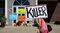 A protester holds a sign outside of Dr. Walter Palmer's dental clinic on July 29, 2015.
