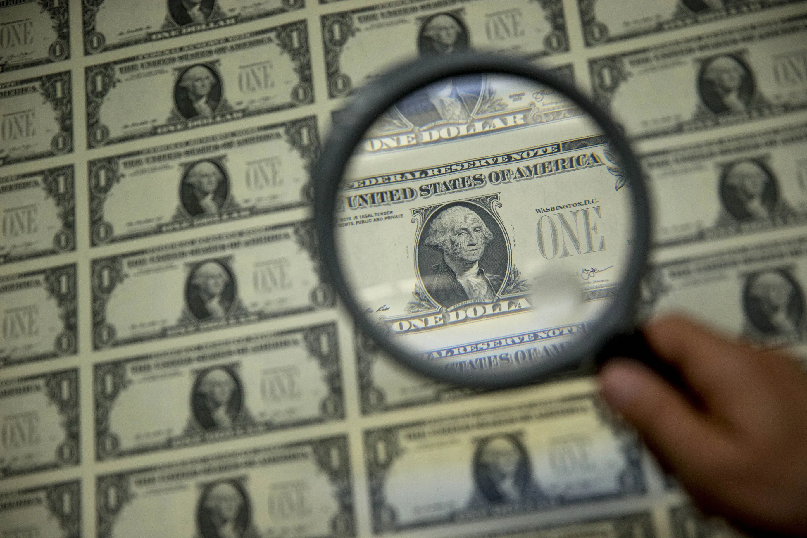 Operations At The Bureau Of Engraving And Printing As The $1 Bill Is Printed