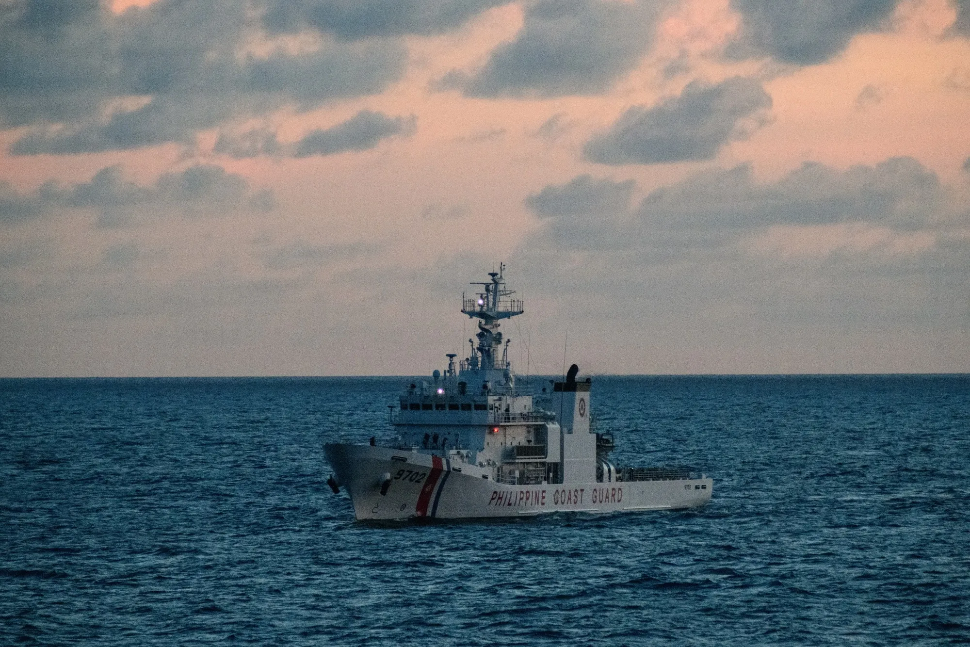 A Philippine Coast Guard vessel escorting a ship on a resupply mission to the communities and Filipino military personnel stationed in the Spratlys, on Dec. 10.