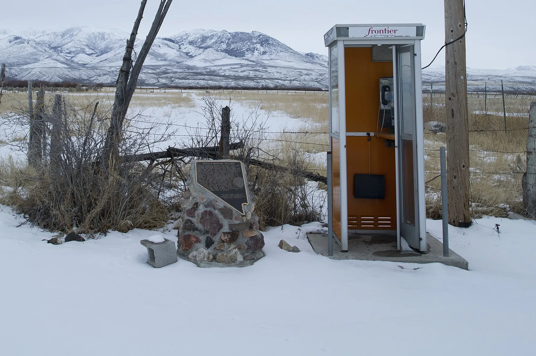 A Frontier Communications phone booth stands in Jiggs, Nevada.