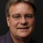 Headshot of John W Casella