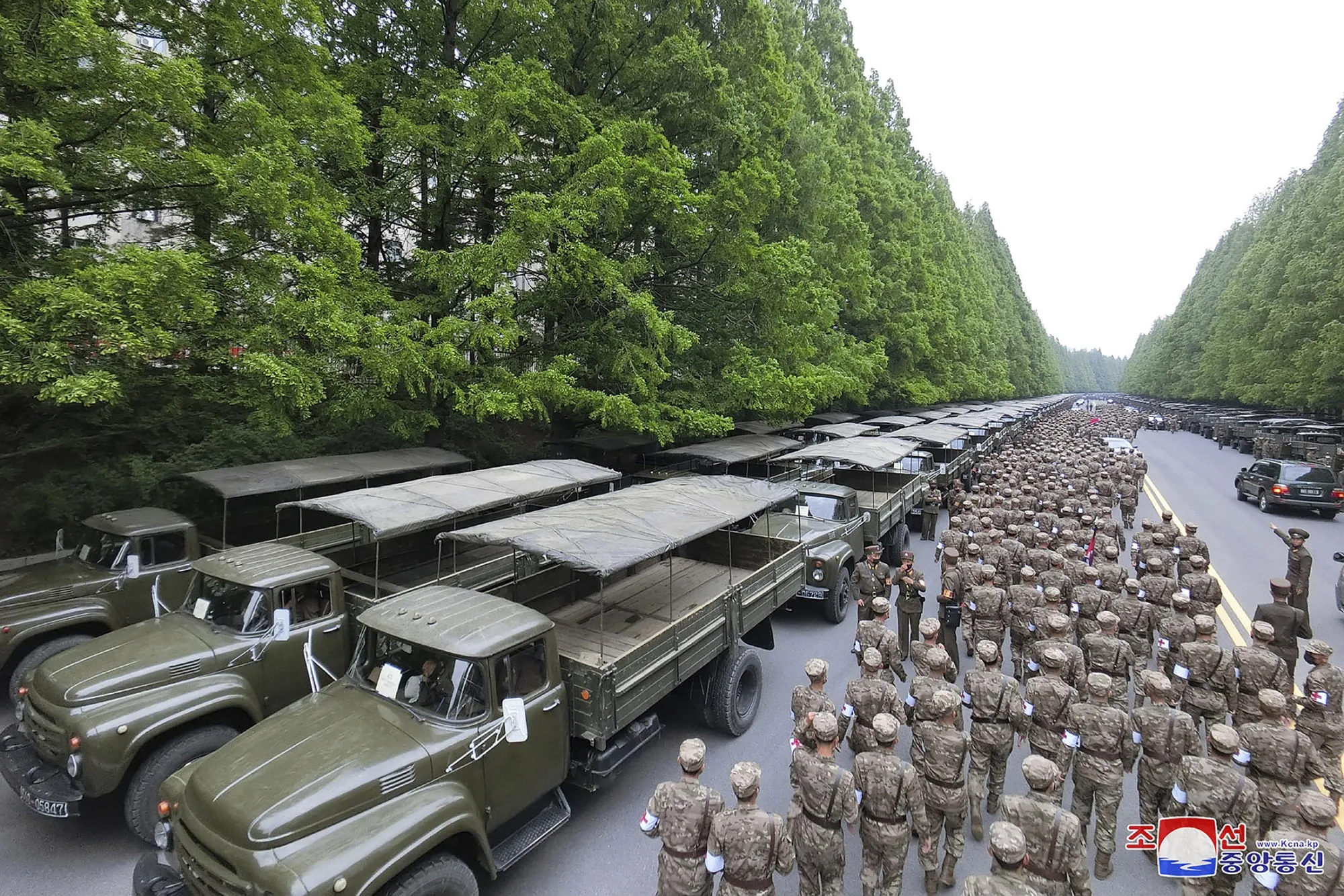 Officers from the Korean People’s Army medical units prepare for a deployment to help with the transport of medicine in Pyongyang on May 16.