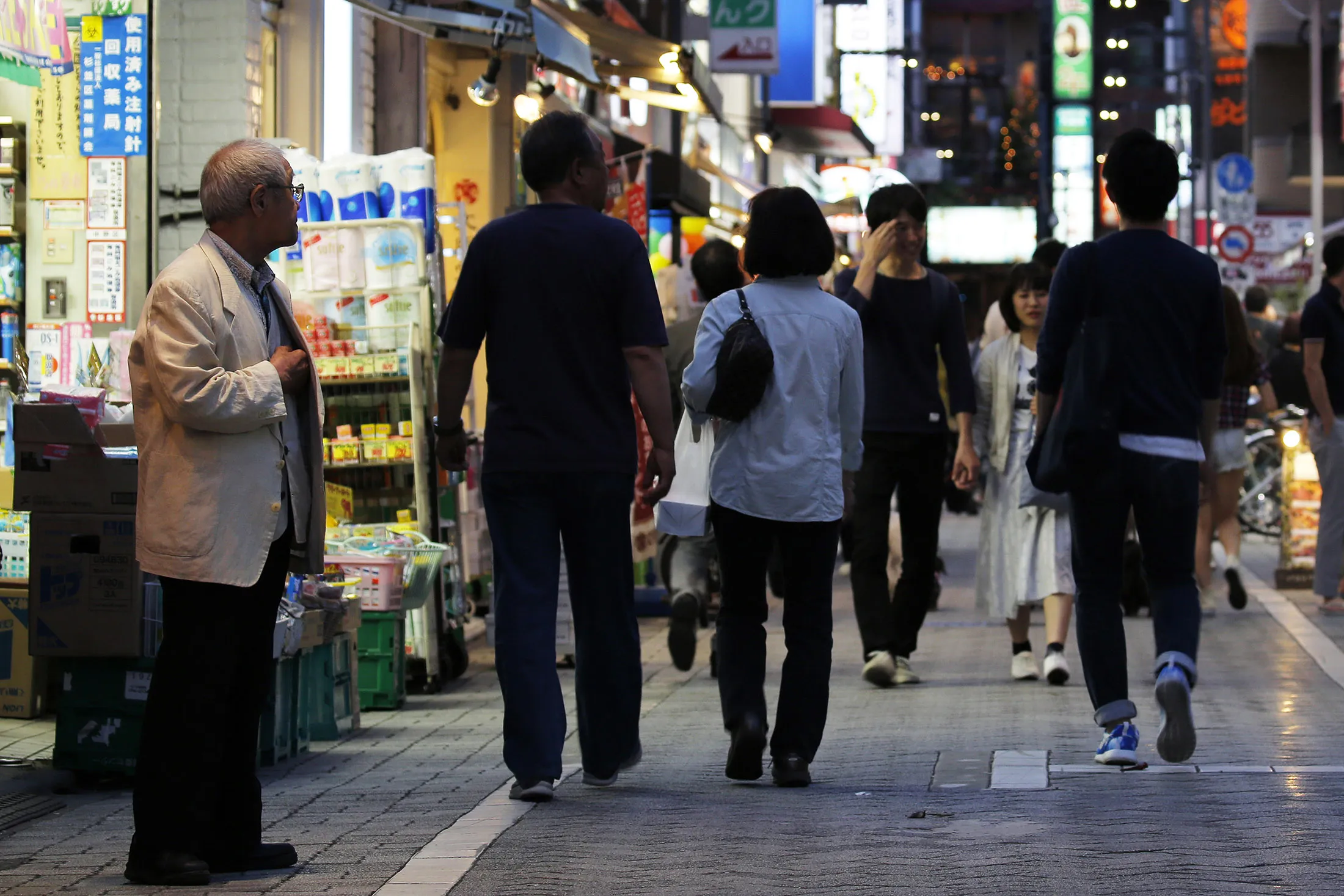 Pedestrians in the Koenji district of Tokyo.
