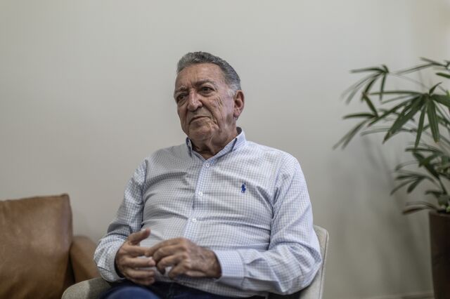 A portrait of Assuero Doca Veronez at his office. 